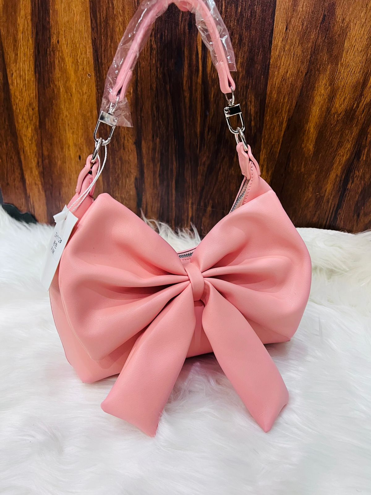 Bow style handbag