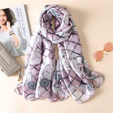 Purple floral silk scarf with grey rose and lattice pattern.