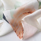 Cream silk-satin scarf with peach rose and green leaf botanical print