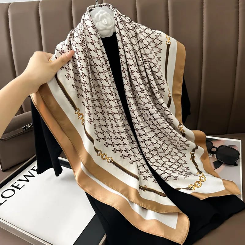Cream silk scarf with brown monogram pattern and gold chain border