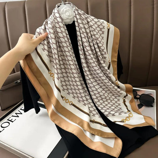 Cream silk scarf with brown monogram pattern and gold chain border