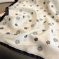 Elegant Camellia Monogram Satin Silk Scarf in Cream and Black